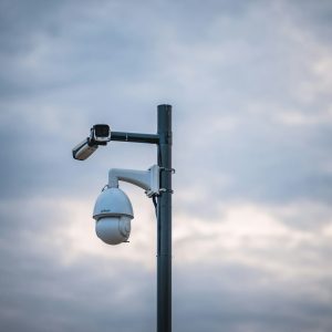 Security camera on a street light pole