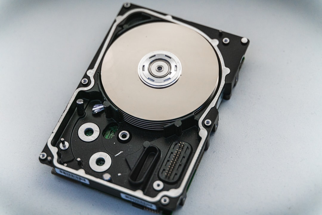 Silver and black hard disk drive