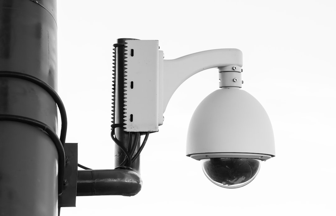 White security camera mounted outdoors